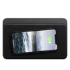 A black wireless charging pad with a smartphone on top, displaying a waterfall image and battery status. Voir les images du produit