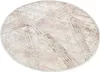 A round rug with a geometric pattern. Voir les images du produit