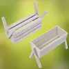 Two wooden planters on a green background. Produktbild-Vorschau