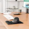 A desk with a computer mouse, keyboard, and a phone. Produktbild-Vorschau