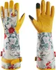 A pair of long gardening gloves with a floral pattern. Produktbild-Vorschau
