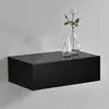 A black floating shelf with two glass vases and a flower on top, mounted on a light gray wall. Náhled obrázku produktu
