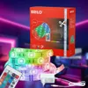 A product shot of LED strip lights and their packaging, set against a blurred background of purple and pink ambient lighting. Produktbild-Vorschau