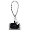 A Karl Lagerfeld Choupette-Etui hand strap with a cat charm attached to a phone case. Anteprima dell’immagine prodotto