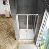 A modern bathroom with a shower cabin, wooden floor, and a window. Produktbild-Vorschau