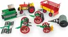 A collection of toy farm equipment, including a tractor, trailer, seeder, rake, roller, and cultivator, arranged on a white background. Náhled obrázku produktu