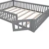 A grey wooden bed frame with a slatted base, viewed from a diagonal angle. Anteprima dell’immagine prodotto