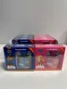 Two Paw Patrol branded perfume boxes are displayed in the foreground, with more boxes stacked behind them. Produktbild-Vorschau