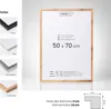 A product image showing a framed poster with color options and dimensions displayed. Produktbild-Vorschau