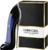 A perfume bottle shaped like a high-heeled shoe next to its packaging. Náhled obrázku produktu