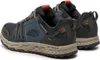 A pair of men's athletic shoes, specifically Skechers Escape Plan, are shown from a rear-side angle against a white background. Produktbild-Vorschau