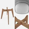 A collage of images showing a chair base and a close-up of a chair seat. Produktbild-Vorschau