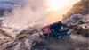 Off-road racing vehicles on a dusty, mountainous terrain. Produktbild-Vorschau