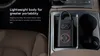 A portable air compressor is placed in a car's center console. Produktbild-Vorschau