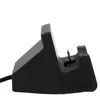 A black charging dock for a smartphone. Podgląd zdjęcia produktu