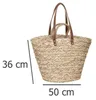 A wicker shopping basket with leather handles, shown against a white background with size dimensions indicated. Náhled obrázku produktu