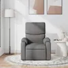 A gray fabric recliner chair is shown in a room with a floor lamp and artwork on the wall. Voir les images du produit