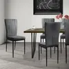 A dining room setting with a table and chairs. Náhled obrázku produktu