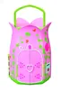 A pink toy cottage with green vines and butterflies. Produktbild-Vorschau