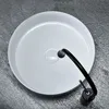 A white basin with a black faucet, viewed from above. Anteprima dell’immagine prodotto
