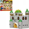 A Super Mario Bowser Castle Deluxe Playset toy is shown, with a smaller image of the packaging in the top left corner. Náhľad obrázku produktu
