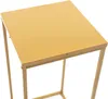 A close-up view of the top of a gold metal rectangular stand. Náhled obrázku produktu