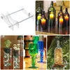 A collage of images showing a bottle cutter, bottles with candles, hydroponic planters, colored glasses, and a bird feeder. Anteprima dell’immagine prodotto