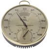 A round analog thermo-hygrometer with a brass-colored frame and black base, displayed against a white background. Anteprima dell’immagine prodotto