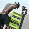 A cyclist is shown experiencing back pain, with a product image and marketing text overlaid. Anteprima dell’immagine prodotto