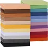 A stack of folded fabric sheets in various colors. Náhled obrázku produktu