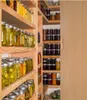 A pantry stocked with jars of preserved food. Podgląd zdjęcia produktu