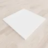 A white shower tray is placed on a light wooden floor. Produktbild-Vorschau