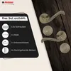 A set of door handles and accessories displayed on a dark wooden surface, with a black panel listing the contents of the set. Produktbild-Vorschau