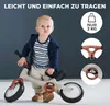 A young child is standing next to a balance bike. The background is a gradient of dark gray to light gray. There are inset images showing details of the bike. Produktbild-Vorschau