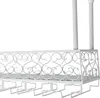 A white metal wine rack with decorative scrollwork and glass holders, shown against a white background. Podgląd zdjęcia produktu