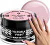 A jar of pink nail gel with a hand displaying the product on its nails. Náhled obrázku produktu