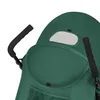 Close-up view of a green stroller canopy with black handles and a mesh window. Produktbild-Vorschau