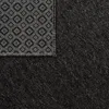 A close-up view of the corner of a rug, showing the texture of the fabric and the underside with a diamond pattern. Produktbild-Vorschau