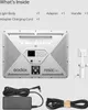 The image shows the contents of a product box, including the light body, adapter, and charging cord. Produktbild-Vorschau