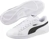A pair of white Puma sneakers with black accents, shown from a top-down perspective, with one shoe lying flat and the other shown from the sole. Podgląd zdjęcia produktu