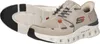 A pair of men's athletic shoes are shown from a diagonal angle against a white background. Voir les images du produit