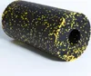 A black foam roller with yellow speckles, shown on a white background. Anteprima dell’immagine prodotto