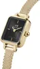A close-up studio shot of a gold-colored women's watch with a black face. Produktbild-Vorschau