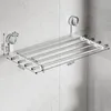 A wall-mounted drying rack with multiple bars, shown attached to a tiled wall with suction cups. Dimensions are indicated with measurement lines and text. Anteprima dell’immagine prodotto