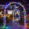 A pathway decorated with Christmas lights leading to a house entrance. Produktbild-Vorschau