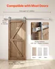 A sliding barn door hardware kit is shown installed on a wooden barn door, with diagrams illustrating dimensions and compatibility. Podgląd zdjęcia produktu
