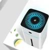 A white humidifier with a blue illuminated top is placed on a white surface with mint leaves and a slice of lime. Náhled obrázku produktu