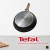 A frying pan with a wooden handle is shown from underneath, with the Tefal logo and product description below. Náhľad obrázku produktu