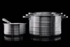 A set of stainless steel pots and pans are displayed against a black background. Produktbild-Vorschau