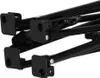 Close-up of the black metal frame and plastic connectors of a foldable table. Produktbild-Vorschau